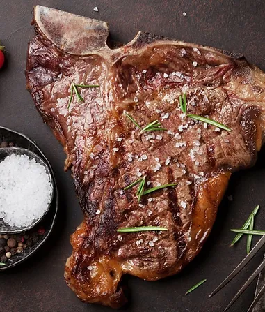 Delicious T bone steak served with rosemary