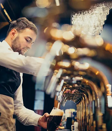 RODE Bar waiter pouring a beer